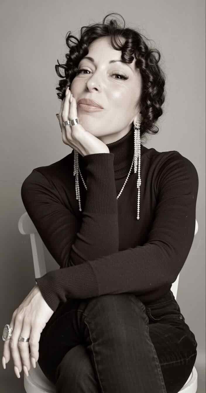 Brie Wieselman — seated turtleneck portrait